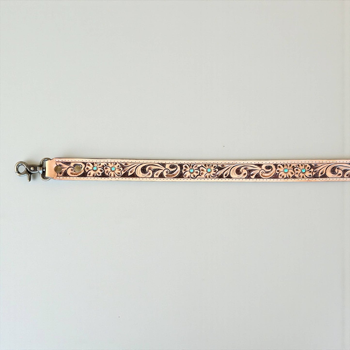Turquoise blossom tooled leather bag strap 