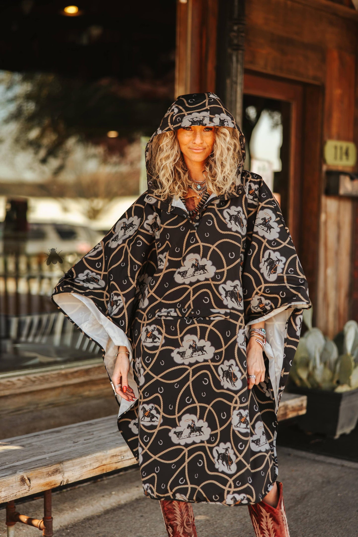 PALUXY PONCHO *BUCK OFF: S/M