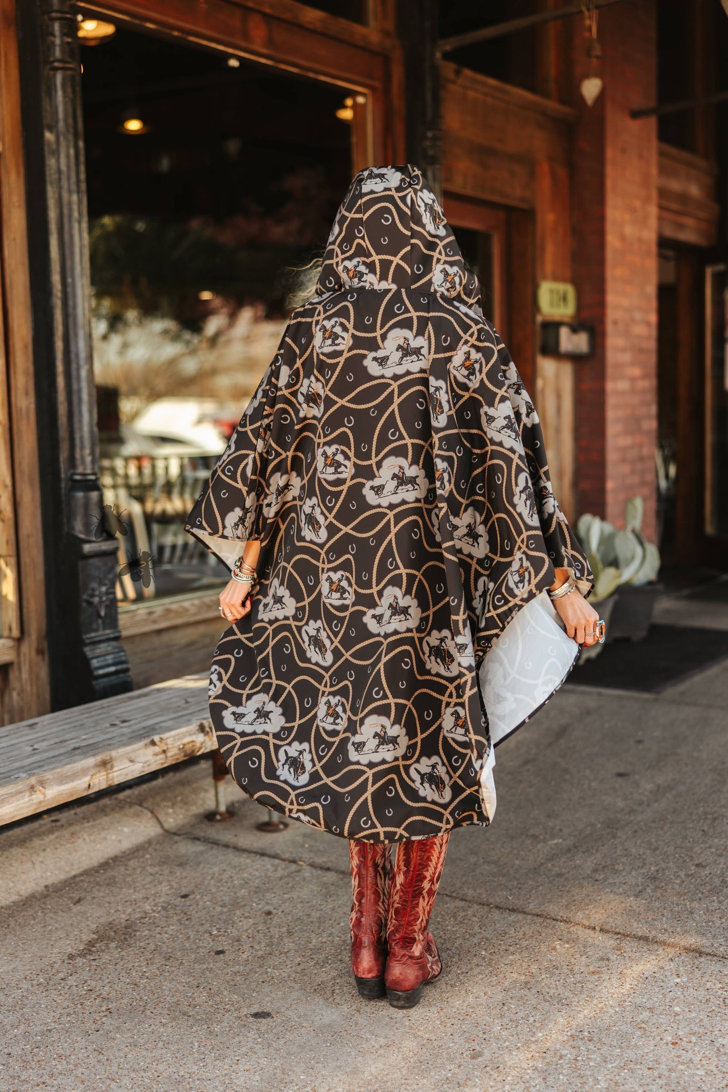PALUXY PONCHO *BUCK OFF: S/M