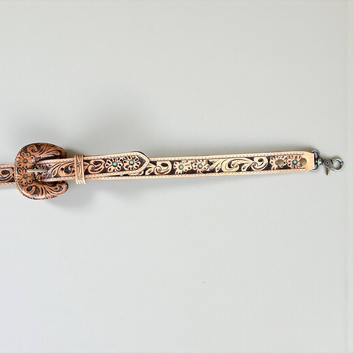 Turquoise blossom tooled leather bag strap 